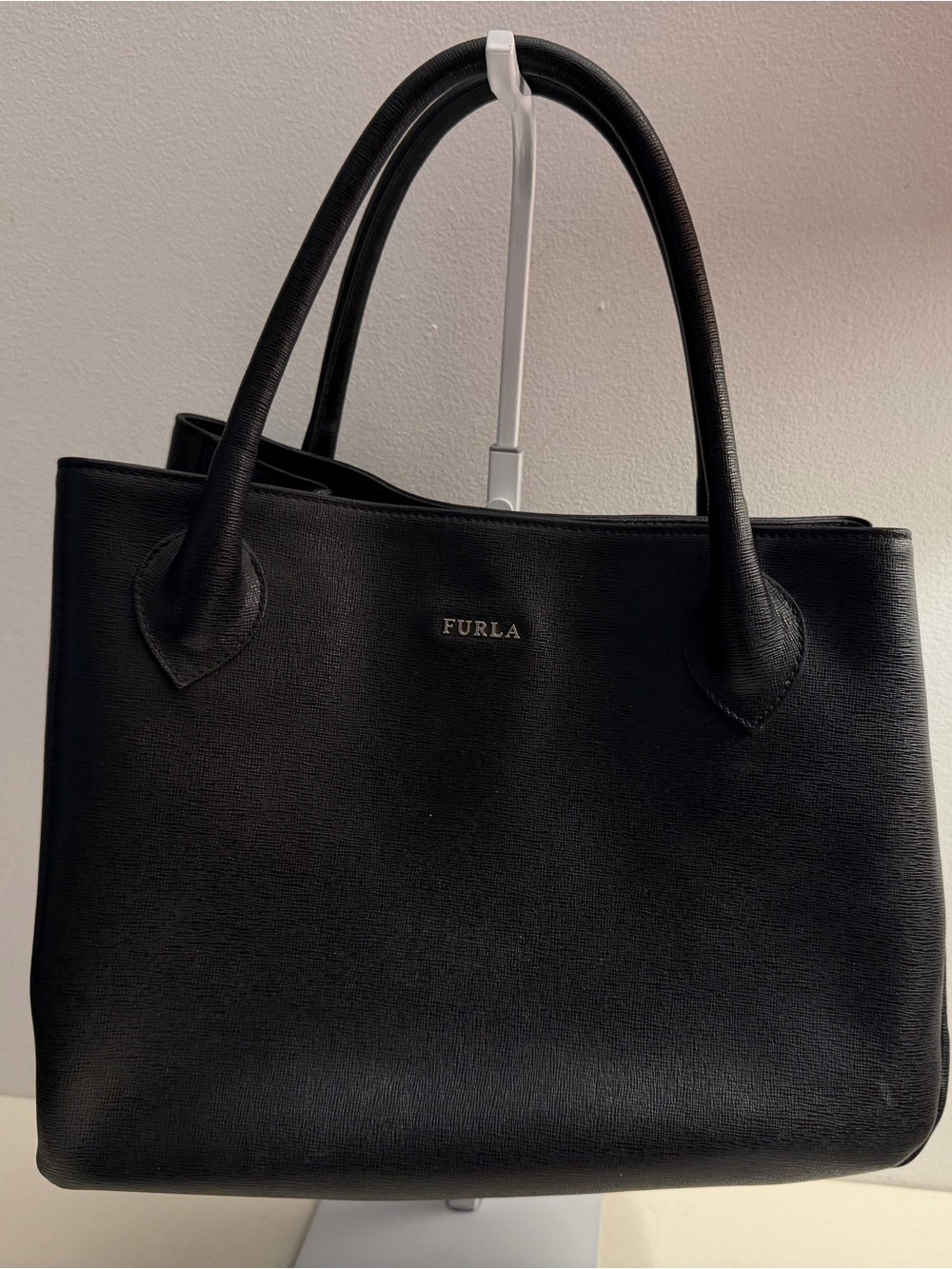 Furla black Saffiano leather with silver toned hardware.